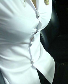 Thai student busting out of her blouse!